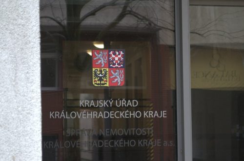 Sign on glass door for regional office.