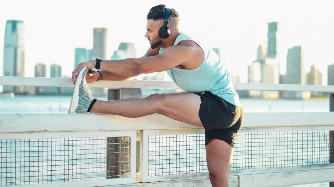 Stretching before a run at Chelsea piers in New York.